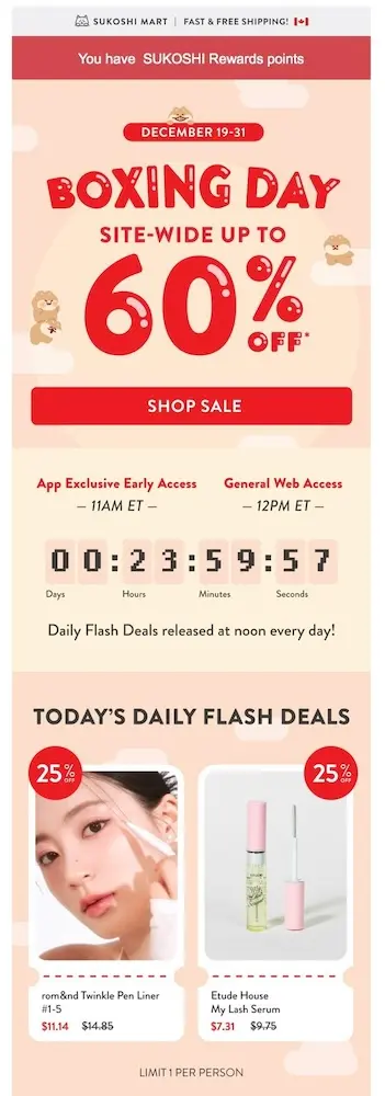 Image shows a Boxing Day marketing email from K-beauty lifestyle brand Sukoshi Mart, which uses bold red font on a peach-colored background to advertise a 60% Boxing Day sale. Beneath the “shop sale” CTA button is a section detailing when access begins for those in the “app exclusive” group vs. general access, with a countdown clock to the sale’s end.