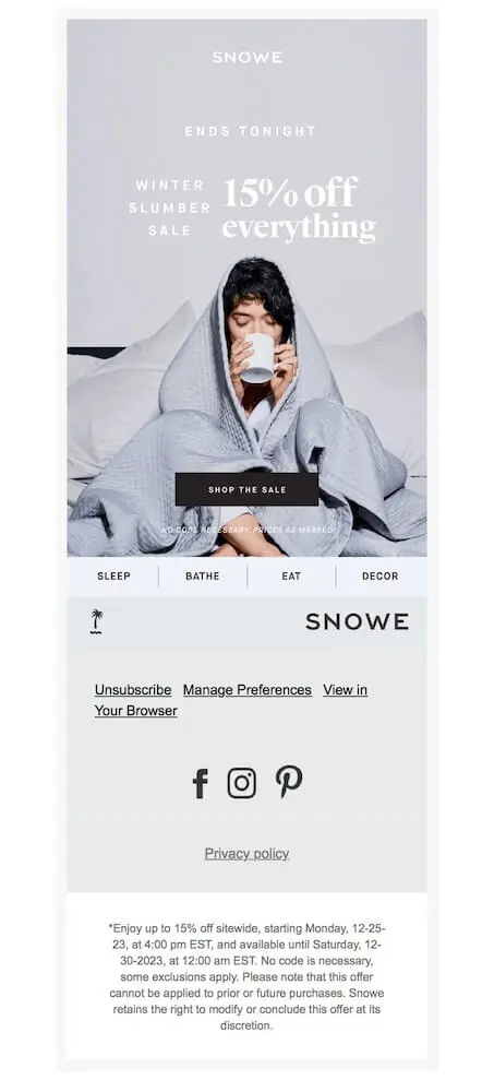 Image shows a New Year’s marketing campaign from home essentials brand Snow, featuring a photo of a woman wrapped in a blanket in bed, sipping from a mug. The email copy is simple and straightforward, reading, “ends tonight: winter slumber sale, 15% off everything,” with a “shop the sale” CTA button.